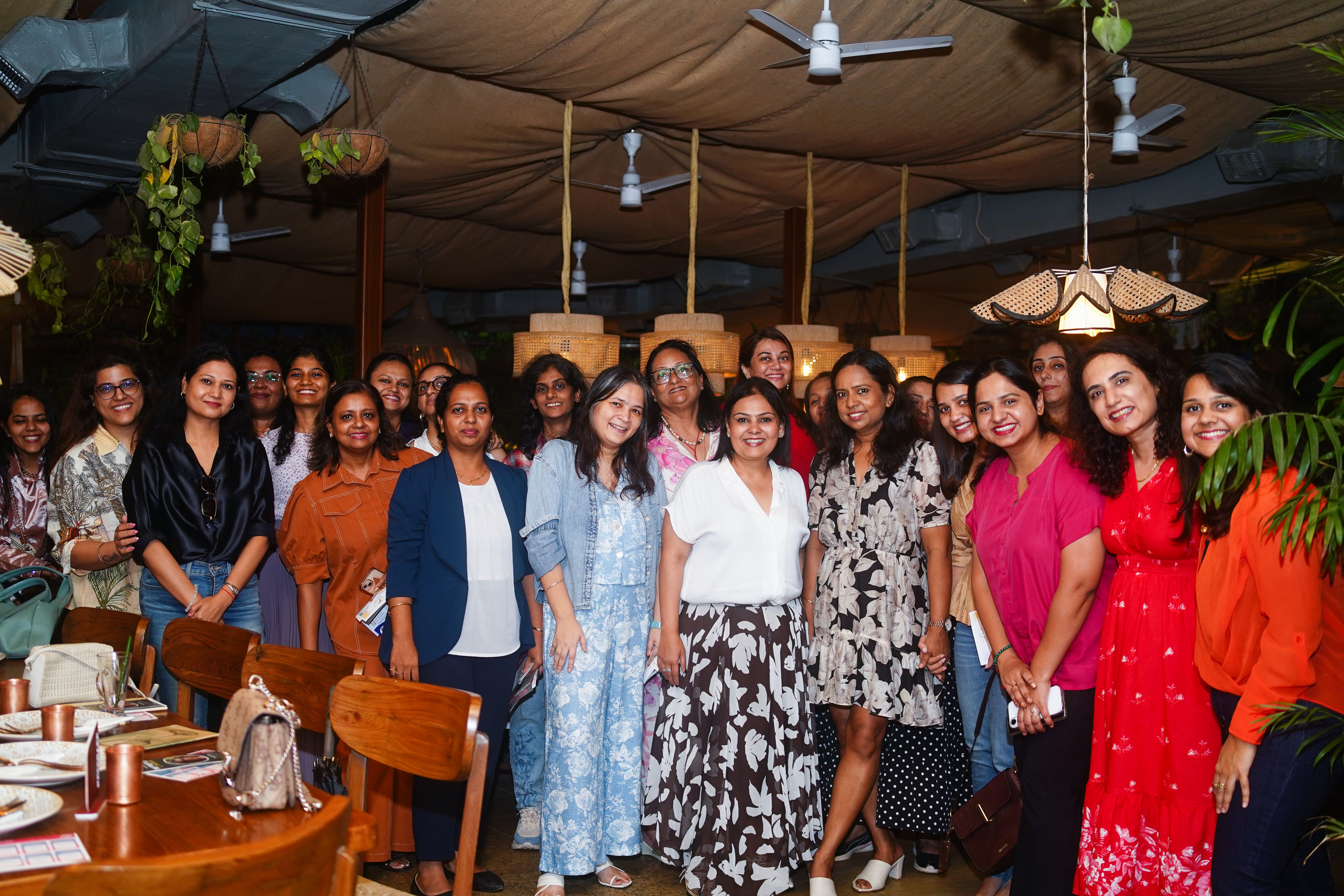 Women founders connecting at a Peach Collar event