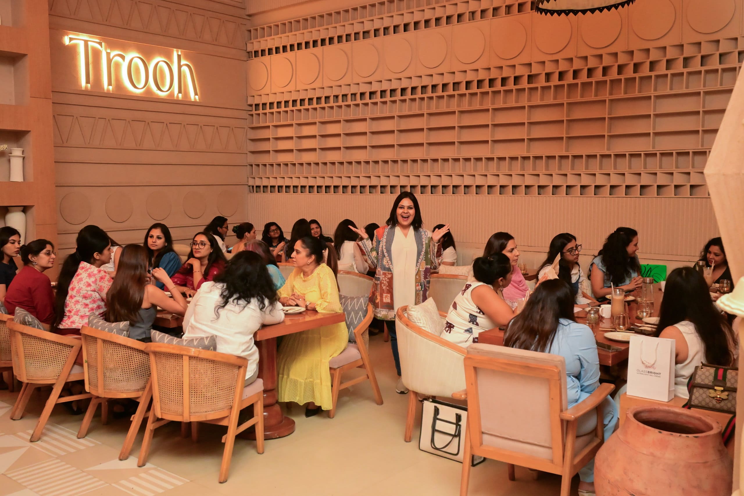 Women founders connecting at a Peach Collar event