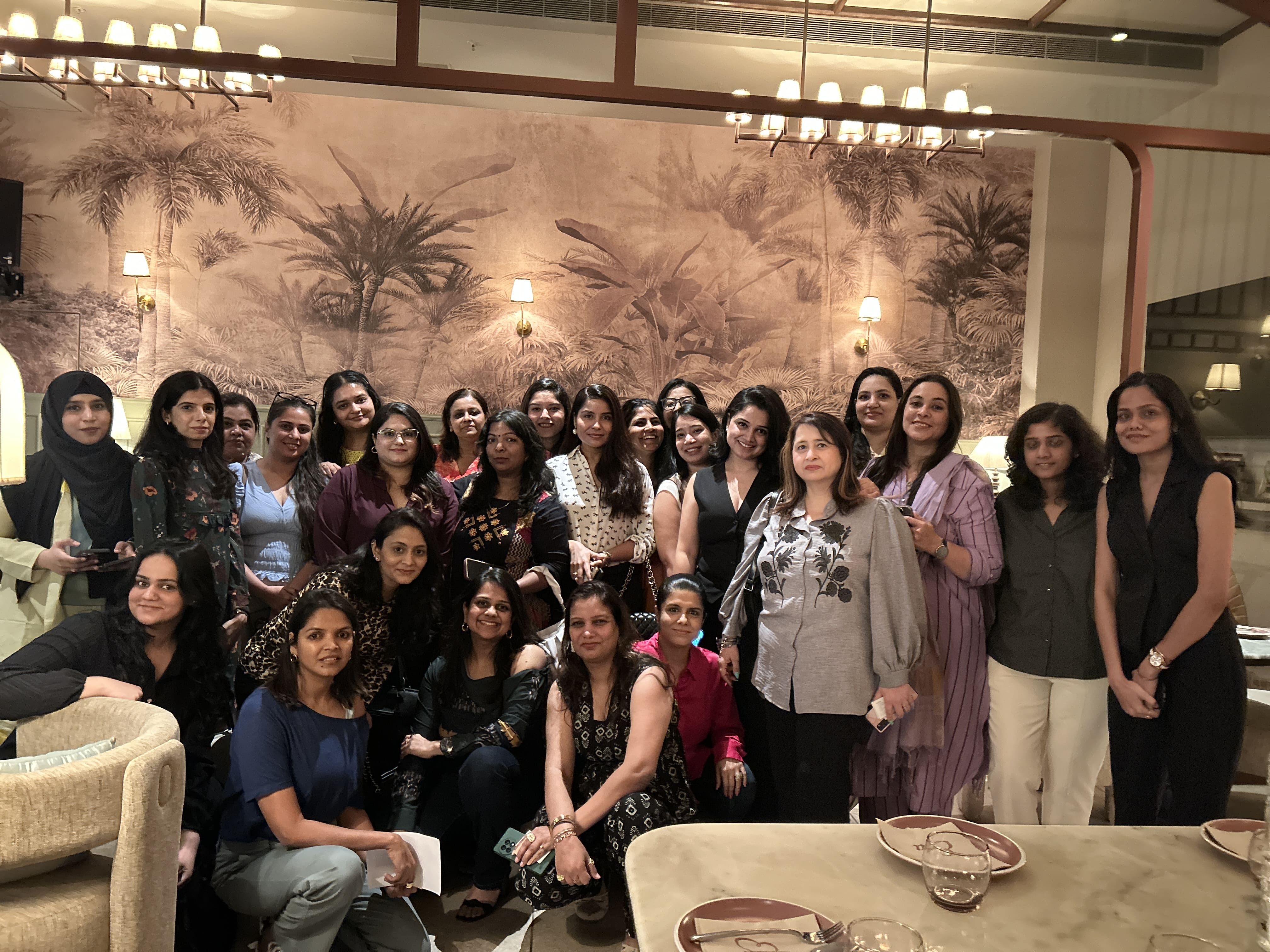 Women founders connecting at a Peach Collar event