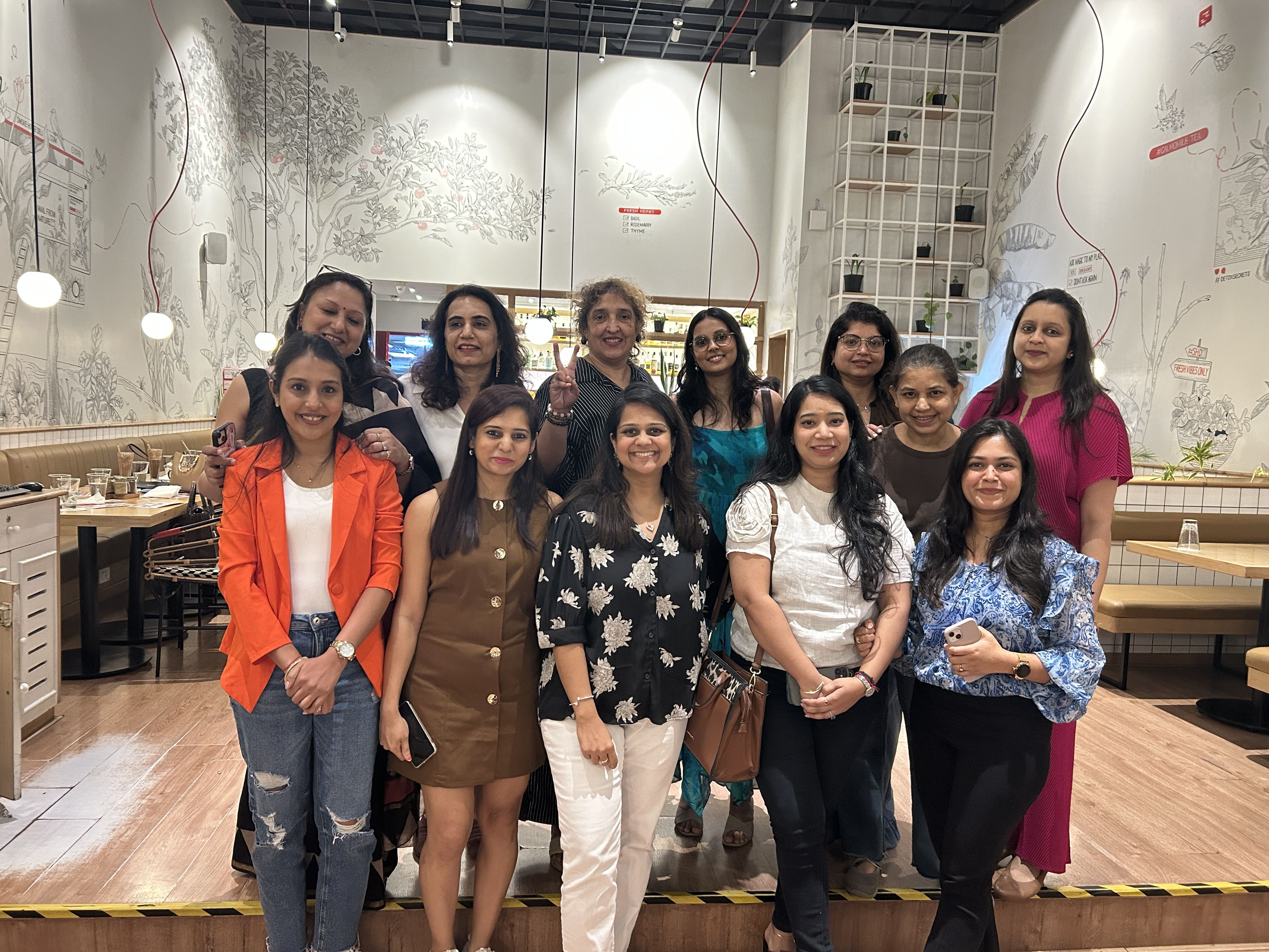Women founders connecting at a Peach Collar event